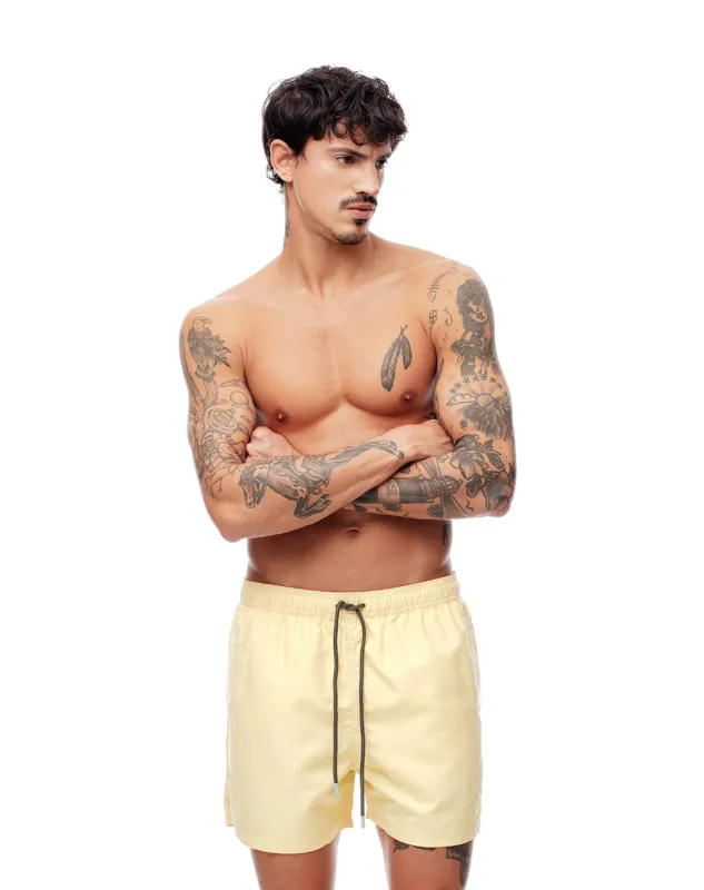 Pantaloneta crema sold by Gef
