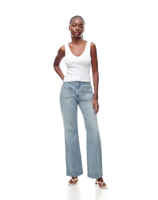 Jean wide leg tiro medio bolsillos frontales indigo medio para mujer sold by Gef