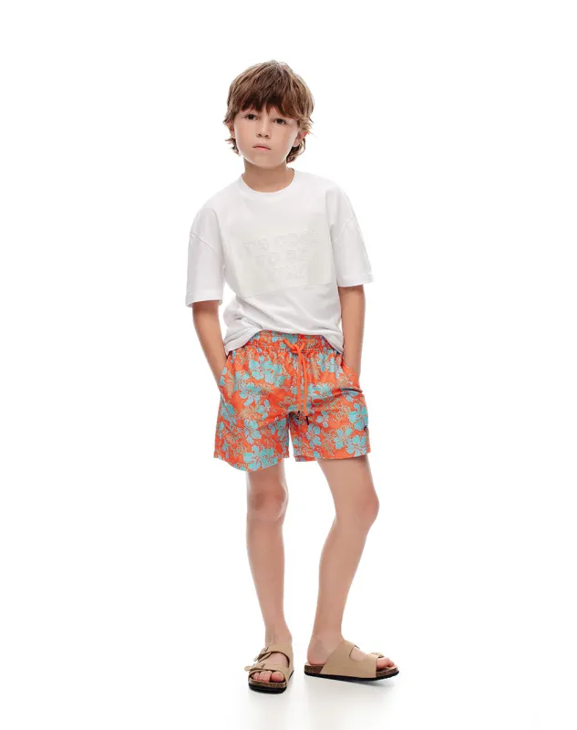 Pantaloneta de baño naranja estampada niño sold by Gef