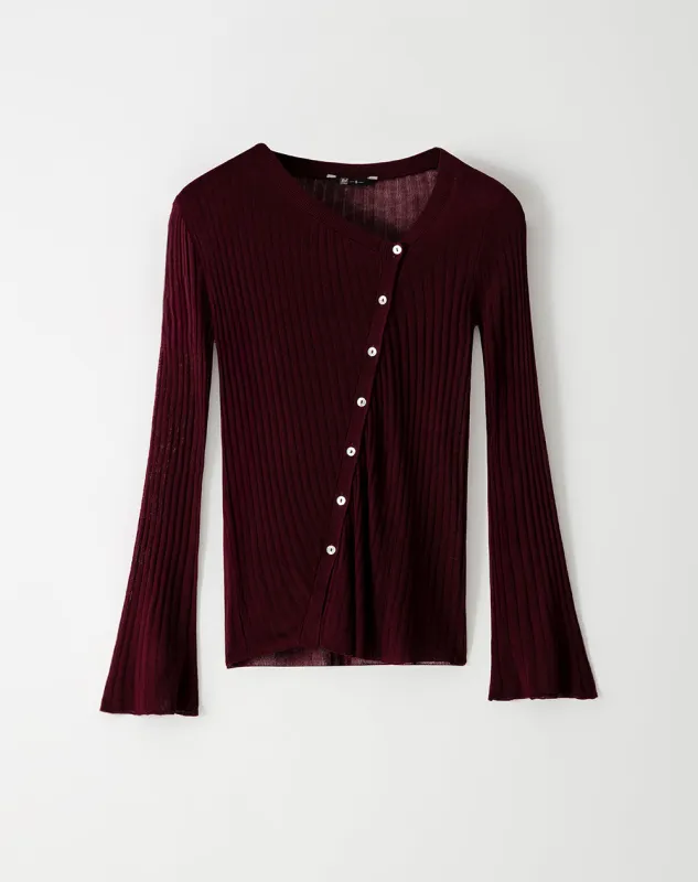 Buzo fitted perilla diagonal vinotinto mujer sold by Gef