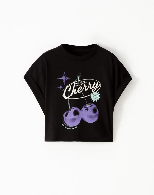 Camiseta regular algodón negra estampada niña sold by Gef