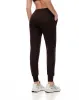 Jogger slim fit tiro medio chocolate sold by Gef
