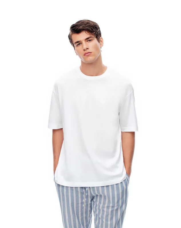 Camiseta relaxed fit manga corta blanca sold by Gef