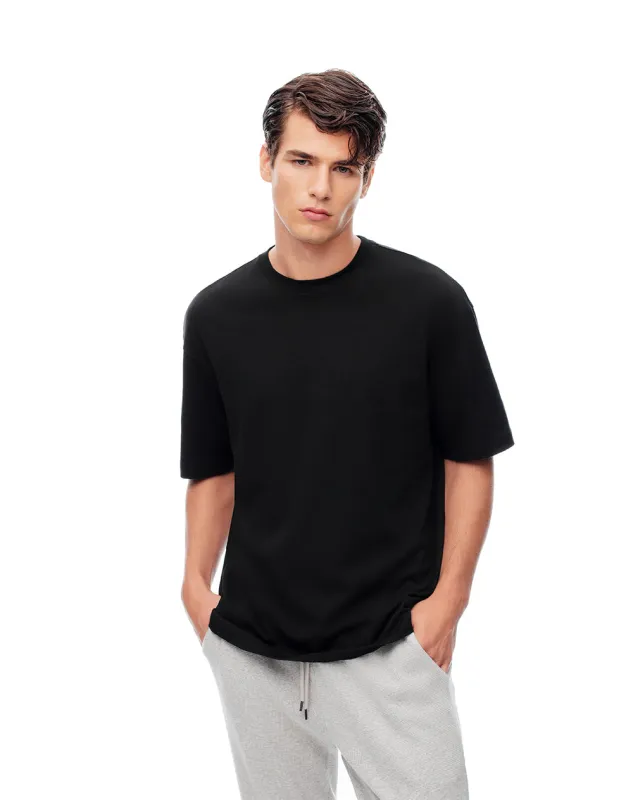 Camiseta relaxed fit manga corta negra sold by Gef