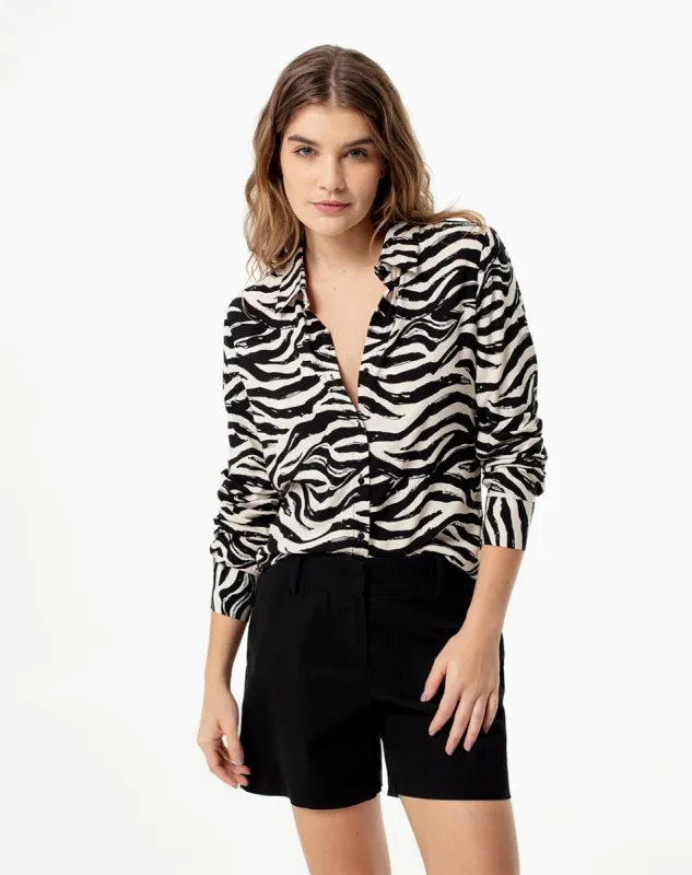 Camisa loose fit manga larga estampada sold by Gef