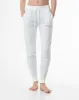 Pantalón slim fit tiro medio crudo estampado sold by Gef