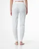 Pantalón slim fit tiro medio crudo estampado sold by Gef