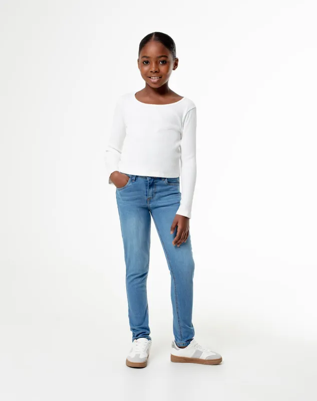 Jean skinny tiro medio elástico interno 100% algodón índigo medio niña sold by Gef
