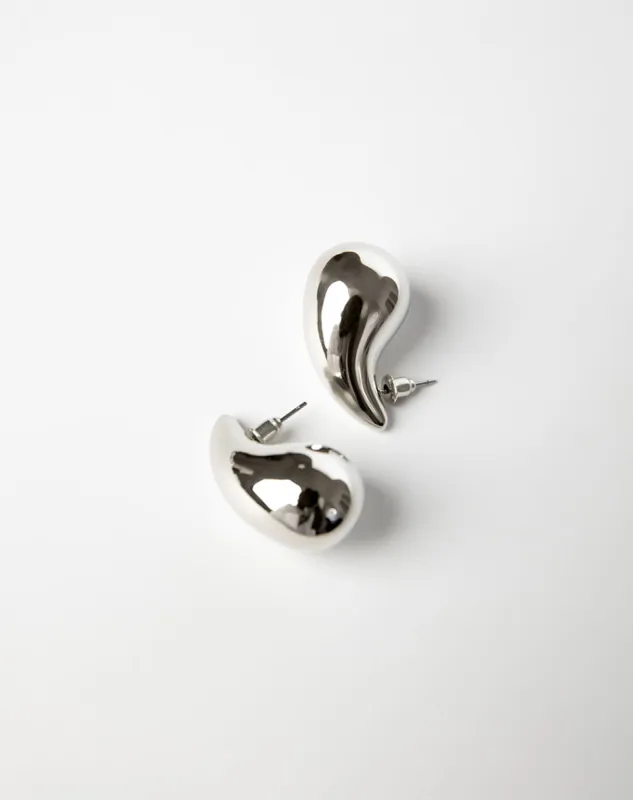 Arete plateado sold by Gef
