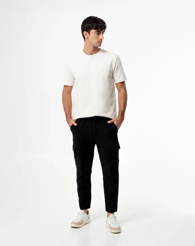 Jogger regular fit tiro medio negro sold by Gef