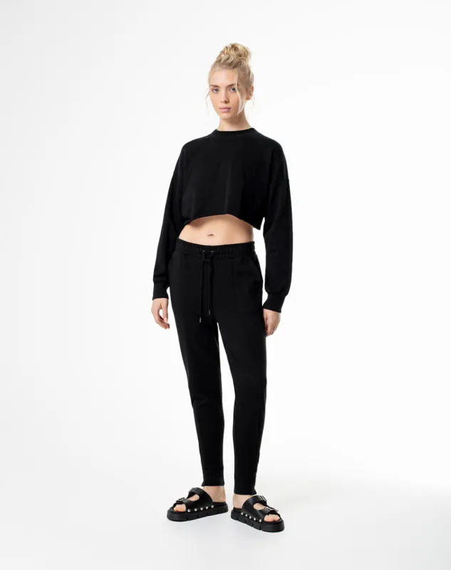 Jogger slim fit tiro medio negro sold by Gef