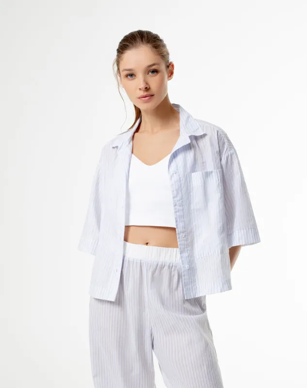 Camisa relaxed fit manga corta rayas azules sold by Gef