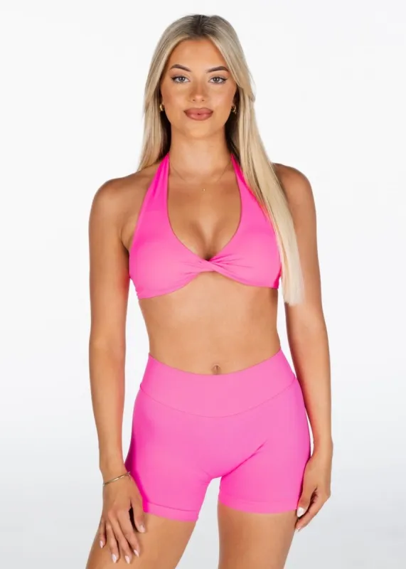 Dynamic Halter Twist Crop - Ultra Pink sold by Kikiva