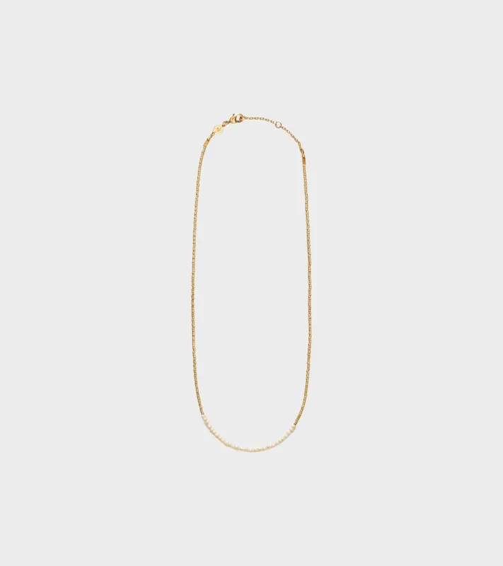 Slim Pearly Necklace Gold sold by Dr. Adams