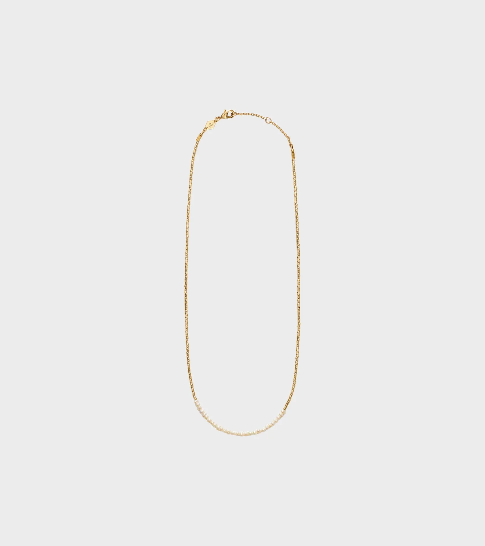 Slim Pearly Necklace Gold sold by Dr. Adams