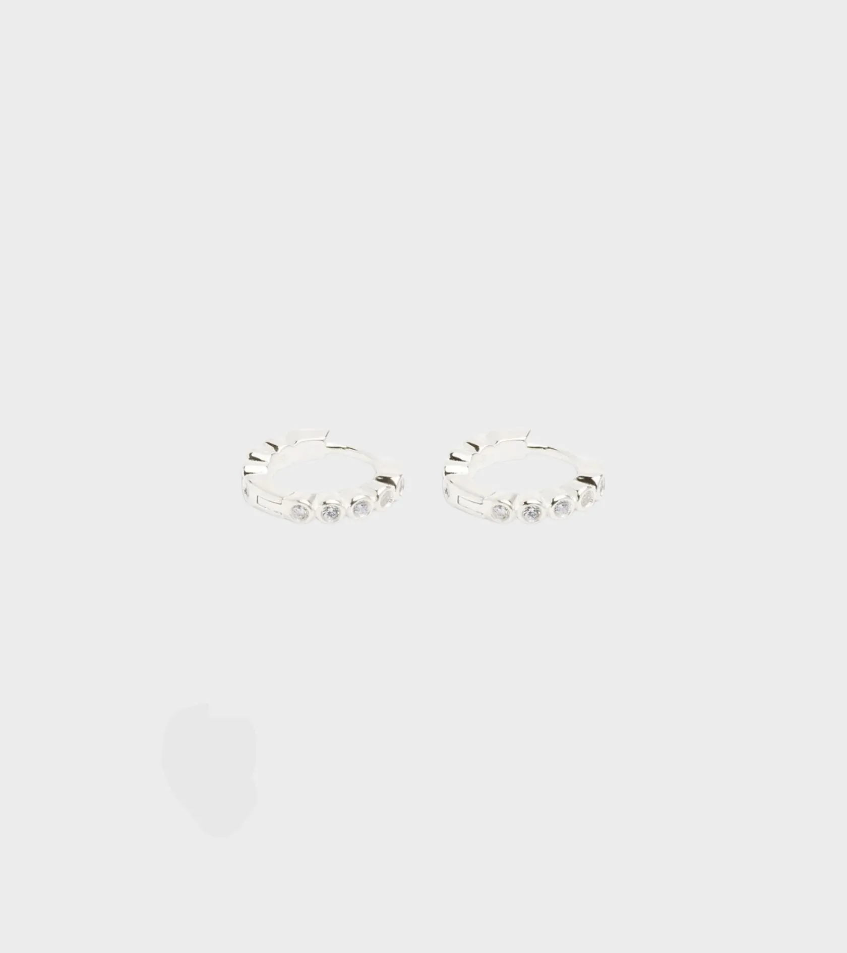 Oda Mini Hoops Silver sold by Dr. Adams