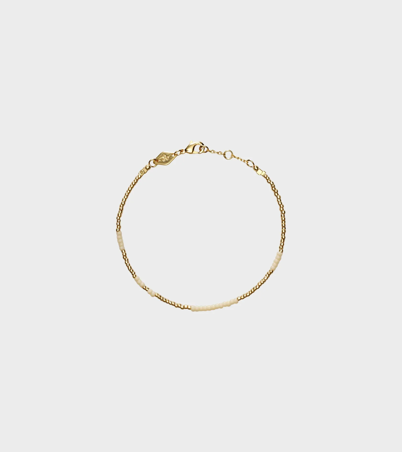 Asym Bracelet Ecru sold by Dr. Adams