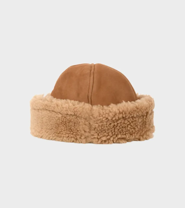 Suede Back Curly Hair Cap Tan sold by Dr. Adams