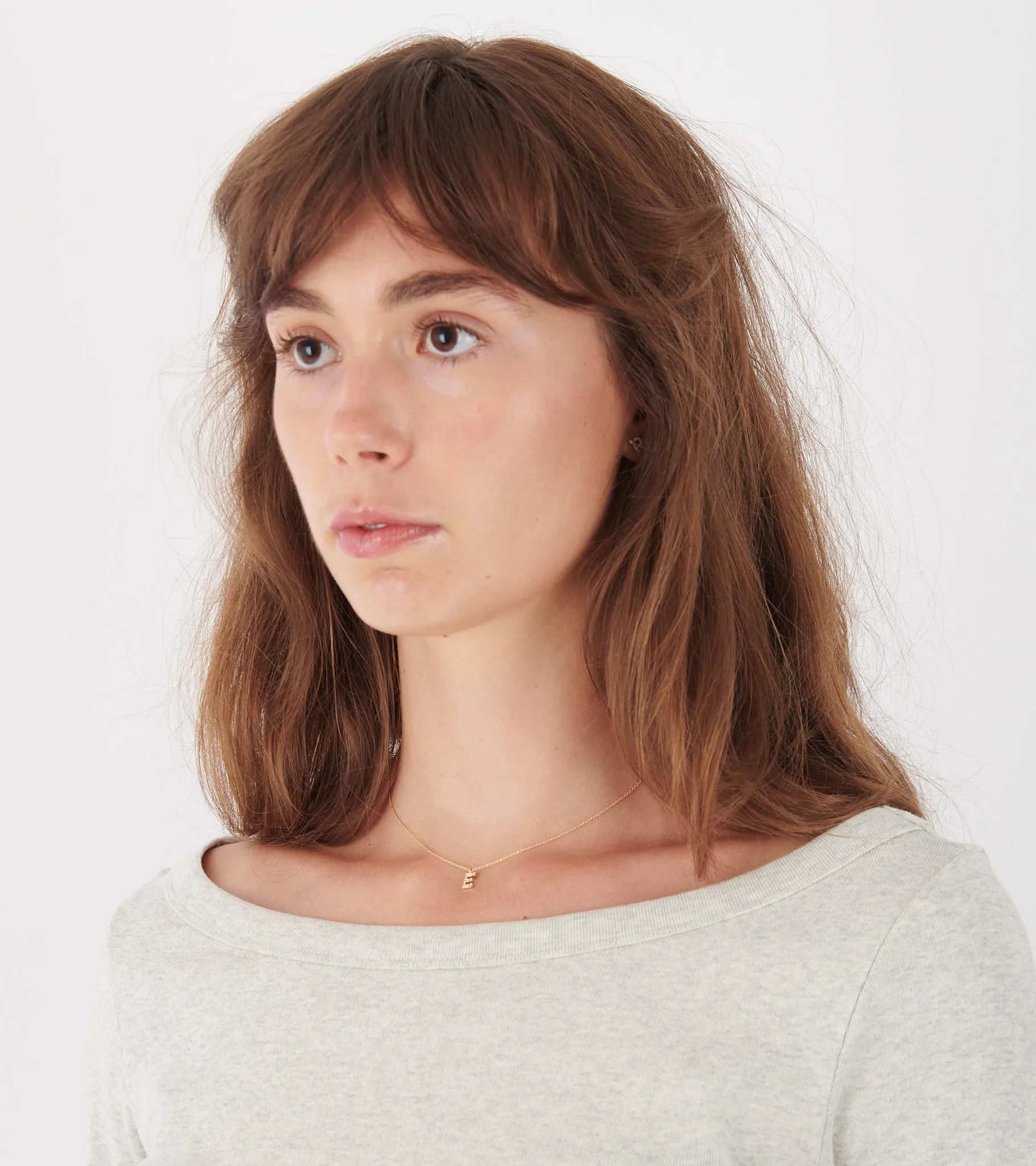 Simple E Necklace Gold sold by Dr. Adams product image thumbnail 2