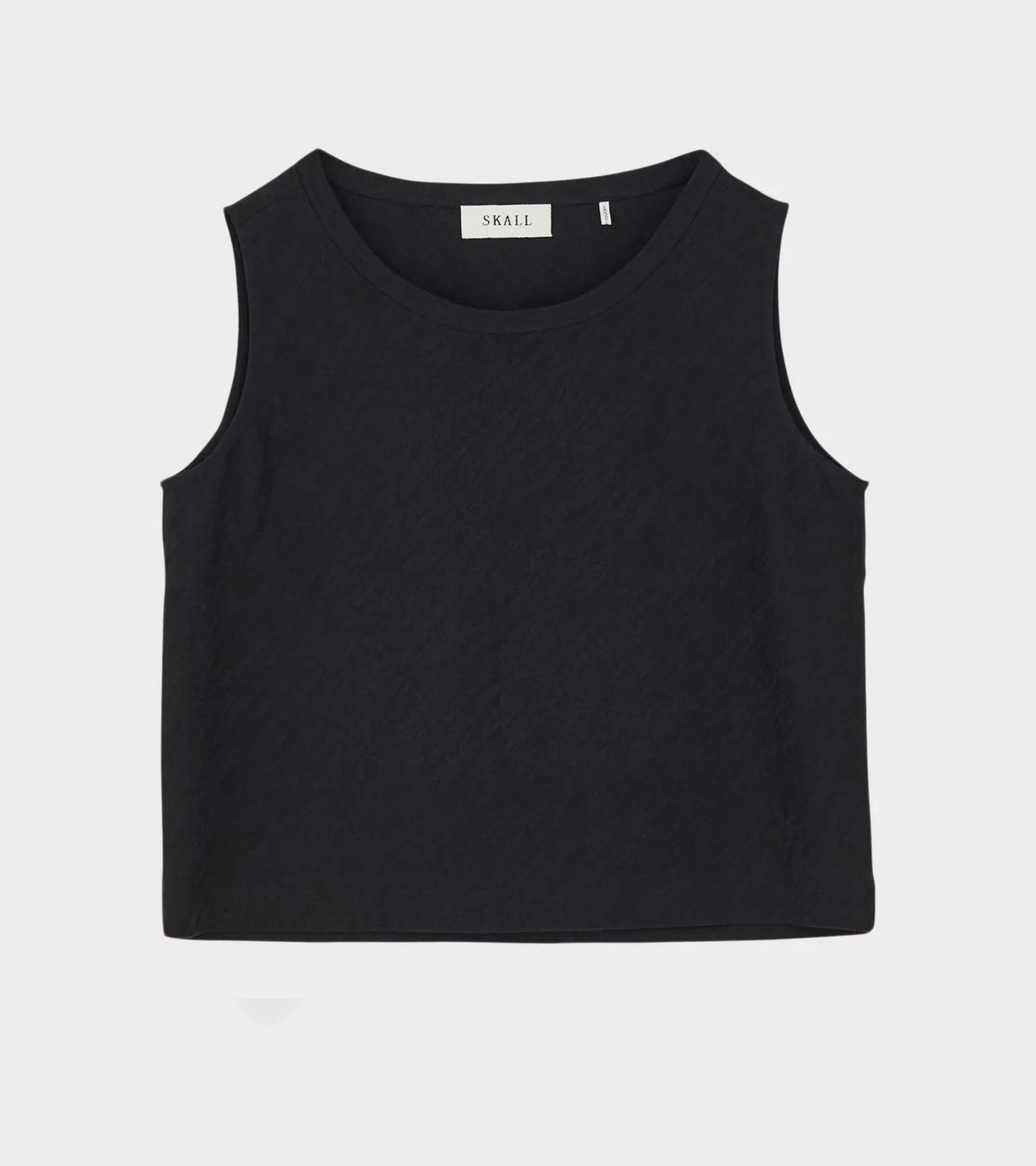 Calla Top Black sold by Dr. Adams