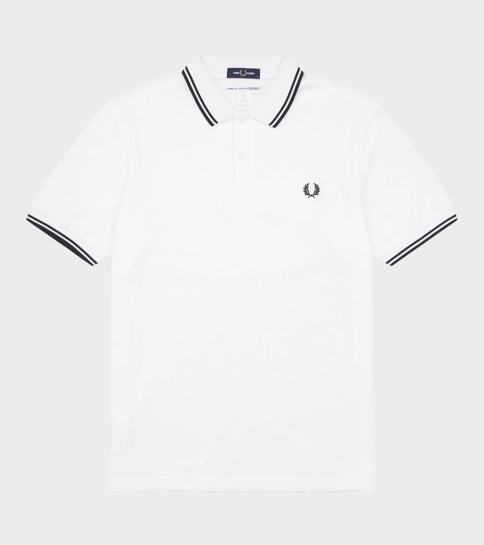 X Fred Perry Strong Will Polo White sold by Dr. Adams