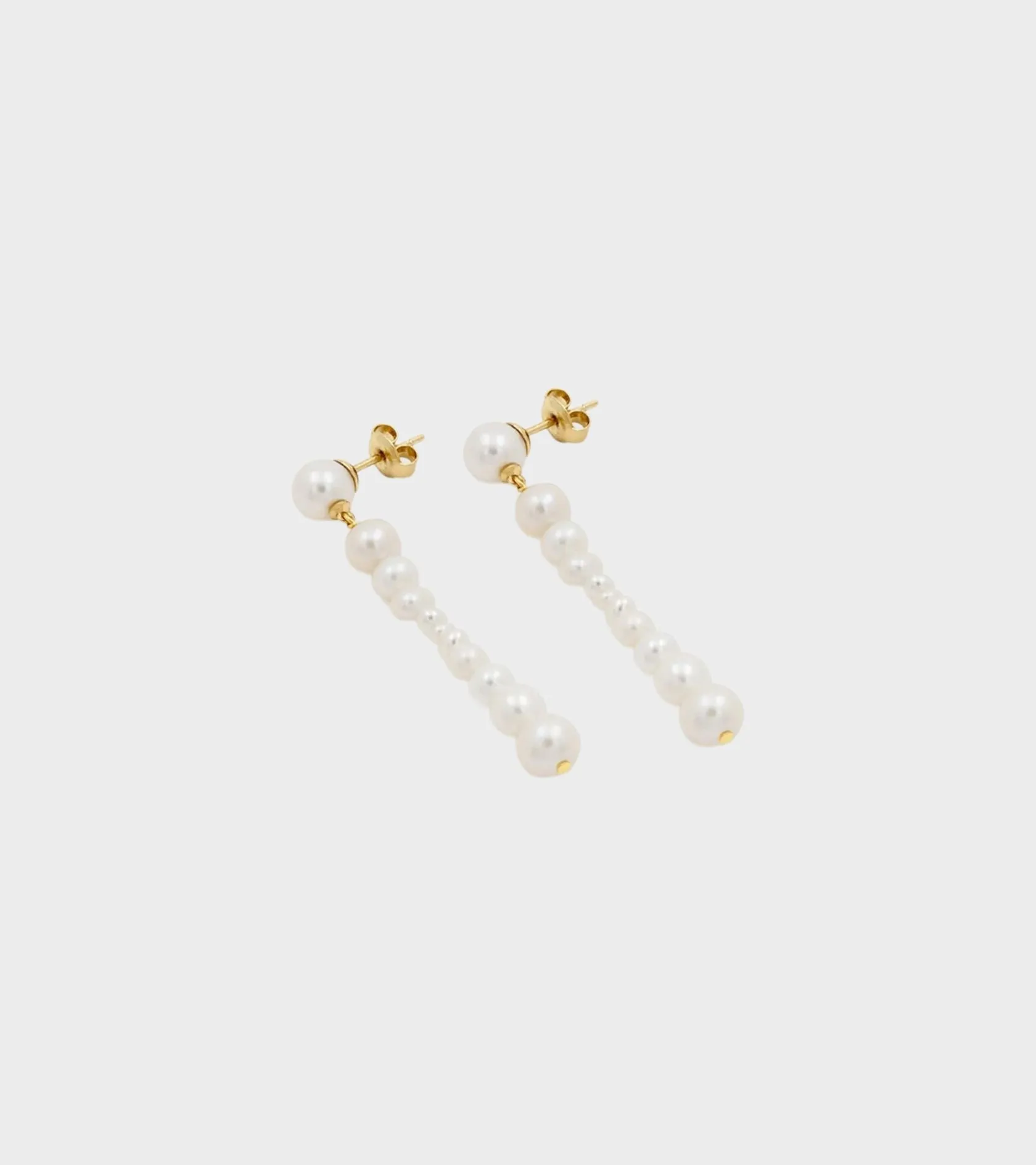 Olga Long Earrings White sold by Dr. Adams