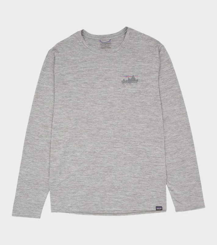 M's L/S Cap Cool Daily Graphic Shirt Skyline Feather Grey made by Patagonia