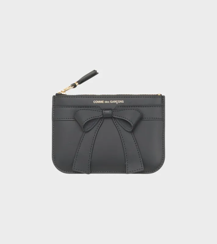 Big Bow Clutch Wallet Black sold by Dr. Adams