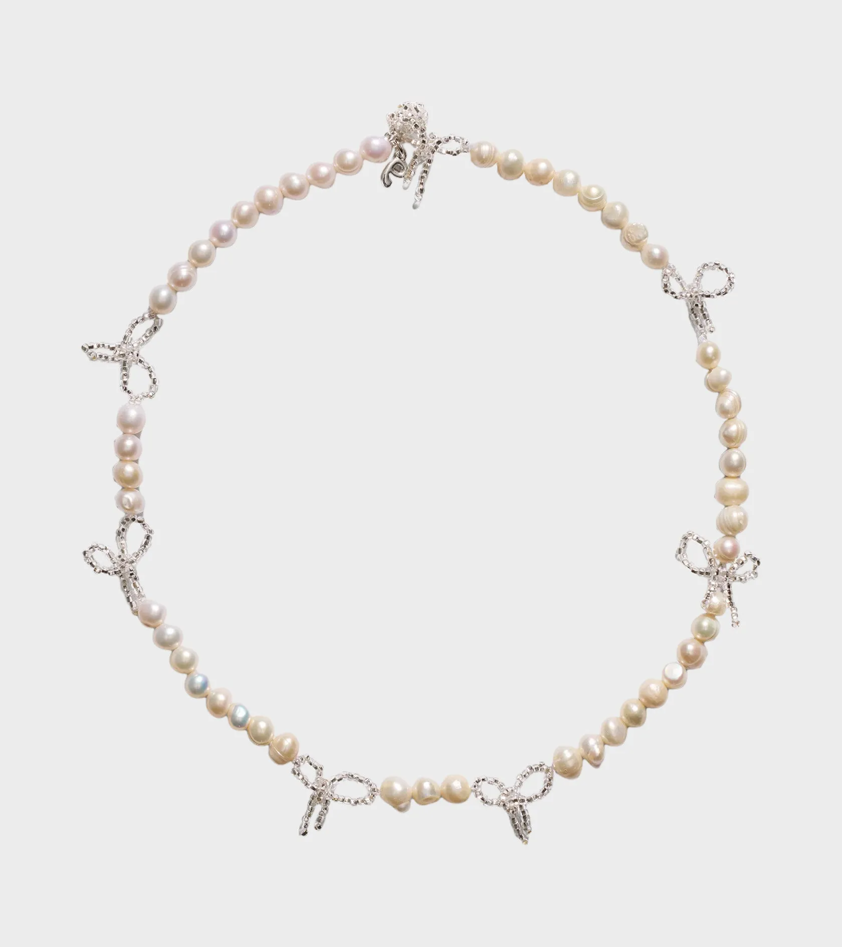 Pearl Multi Bow Necklace White sold by Dr. Adams