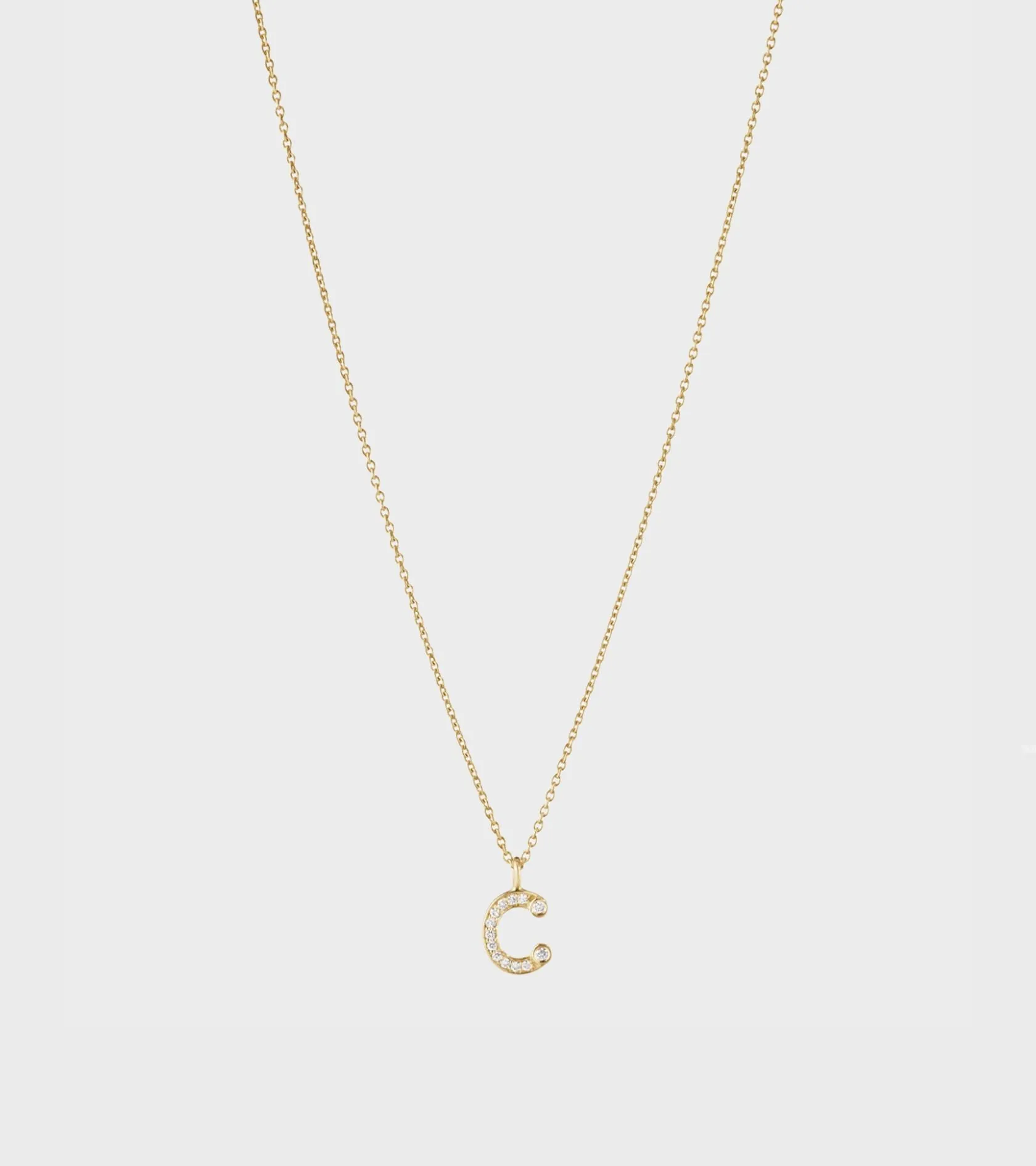 Simple C Necklace Gold sold by Dr. Adams