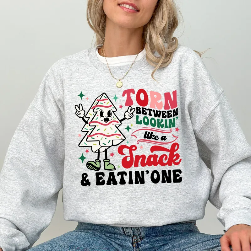 Torn Between Looking Like A Snack And Eating One, Christmas Cakes, Santa, Winter, Xmas Sweatshirt sold by Refinery Number One