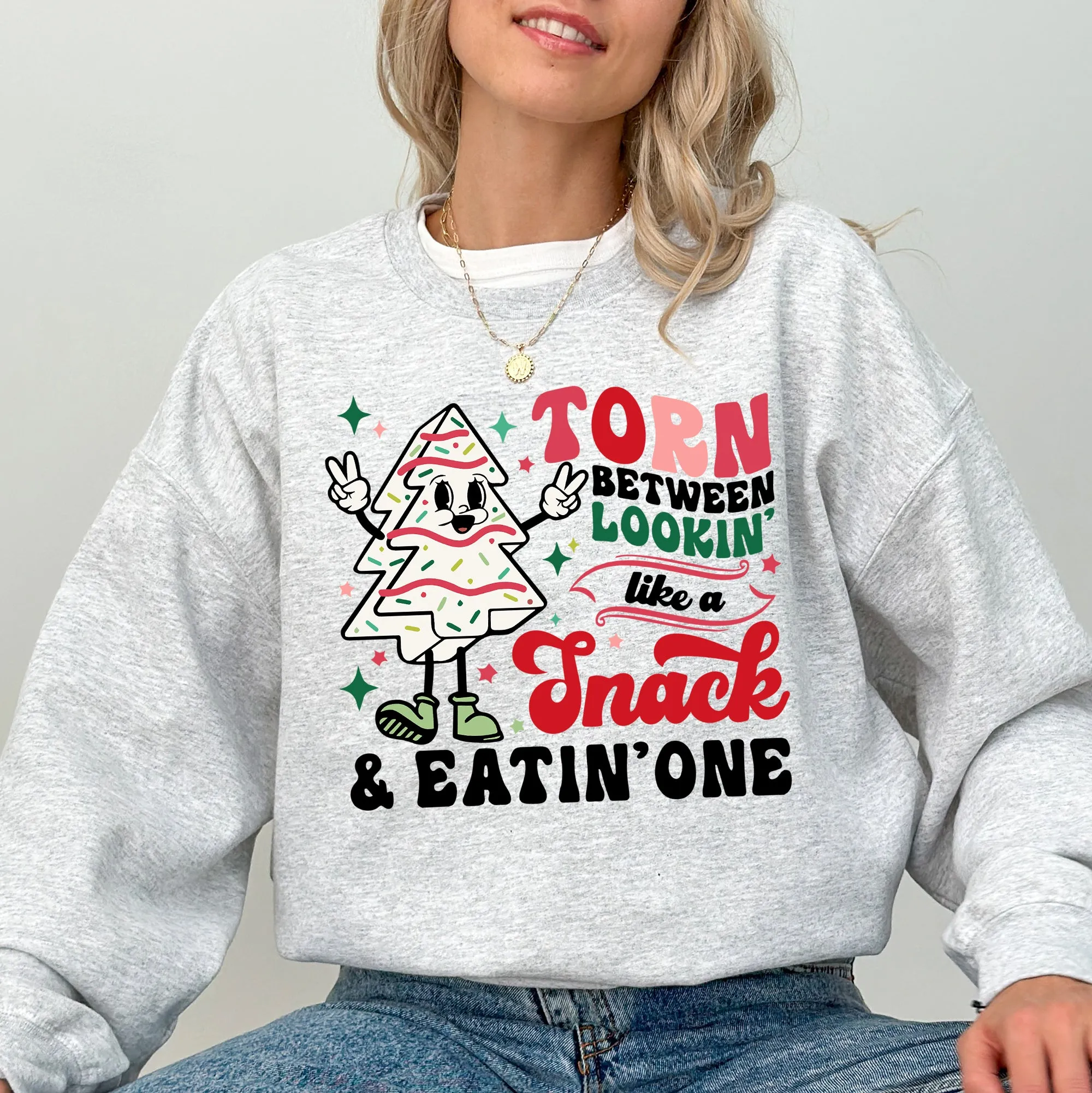 Torn Between Looking Like A Snack And Eating One, Christmas Cakes, Santa, Winter, Xmas Sweatshirt sold by Refinery Number One