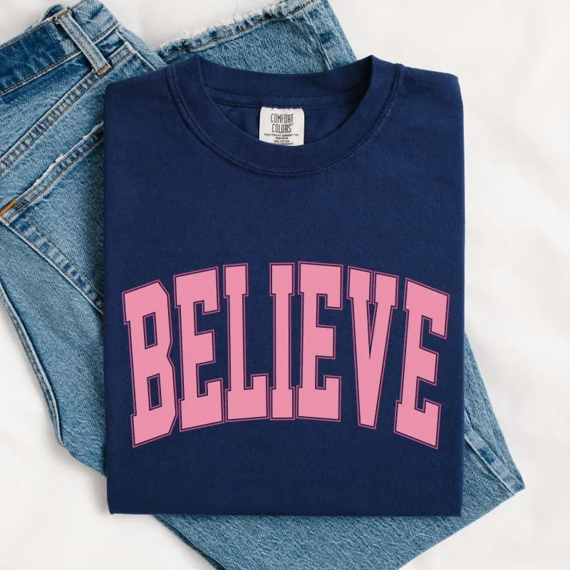 Believe, Varsity, Collegiate, Christmas, Santa, Winter, Xmas Tshirt Comfort Colors T-Shirt sold by Refinery Number One