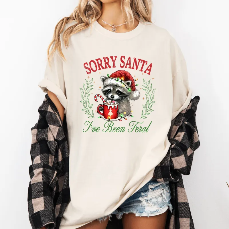 Sorry Santa, I've Been Feral, Raccoon, Hot Chocolate, Christmas, Funny, Cute, Xmas Tshirt Comfort Colors T-Shirt sold by Refinery Number One