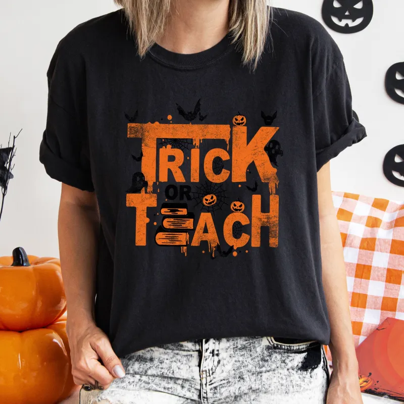 Trick Or Teach Retro Halloween Teacher Comfort Colors Tshirt sold by Refinery Number One