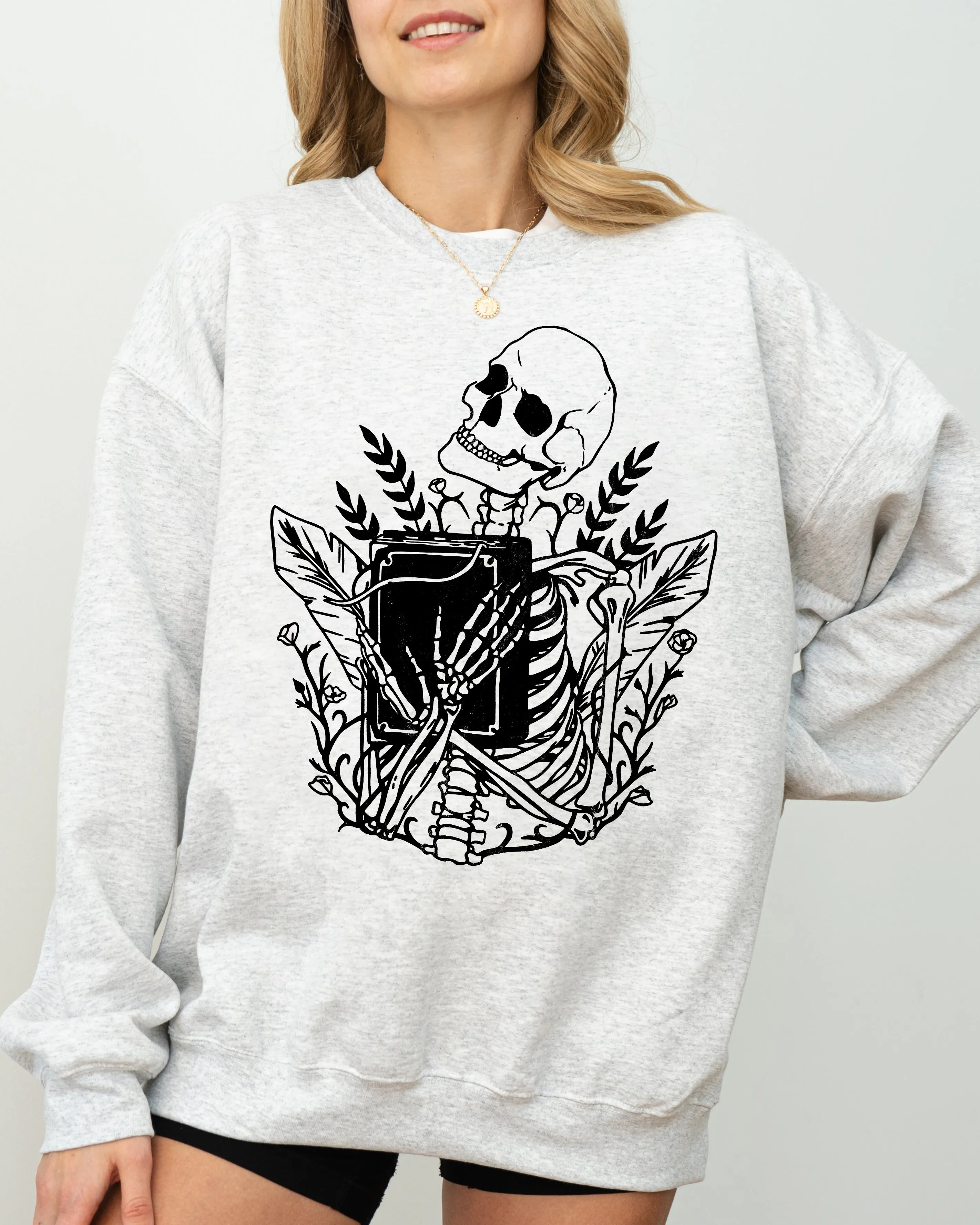 Reading Skeleton, Witch, Ghost, Skull, Spooky, Aesthetic, Meme, Halloween, Costume Sweatshirt sold by Refinery Number One