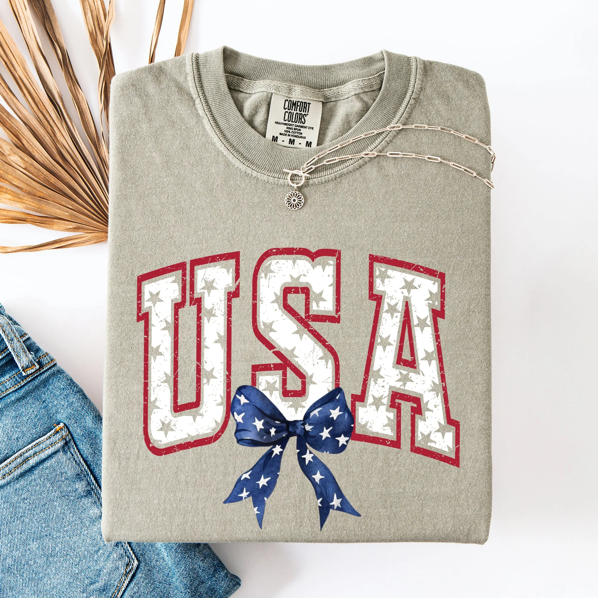 USA, Vintage Varsity, Bow, Ribbon, Patriotic, Gorgeous, America Comfort Colors T-Shirt sold by Refinery Number One product image thumbnail 2