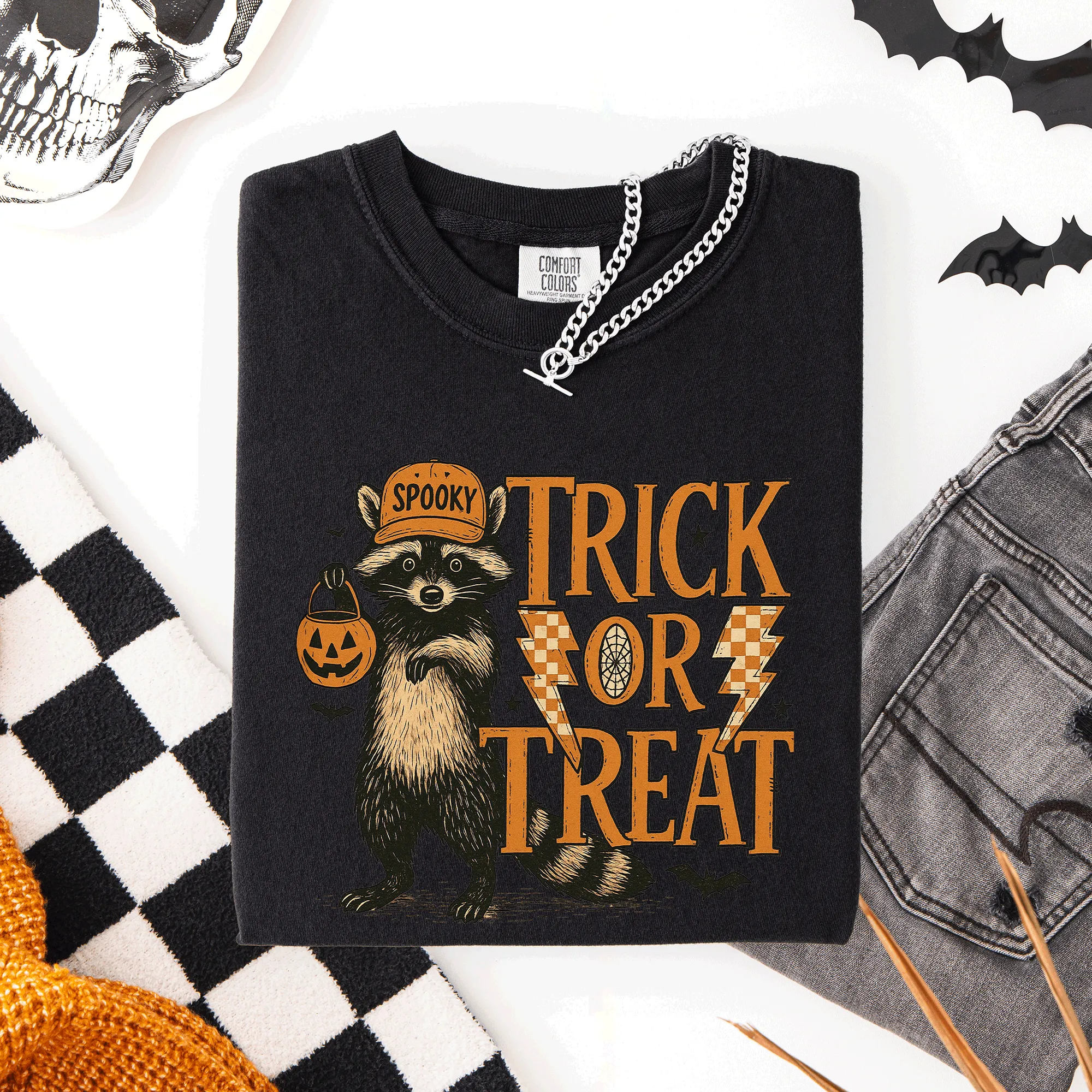 Trick or Treat Raccoon Halloween Mischief With Skeletons Ghosts Cats And Pumpkins Comfort Colors Tee sold by Refinery Number One product image thumbnail 4