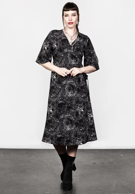SPELLWORK MIDI WRAP DRESS sold by Disturbia