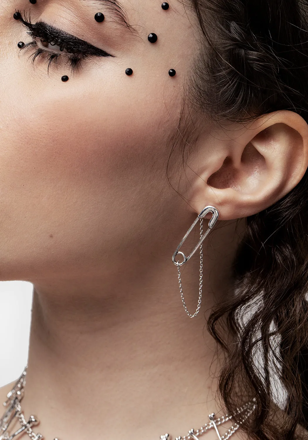 Vicious Silver Plated Safety Pin Stud Earrings With Chain sold by Disturbia
