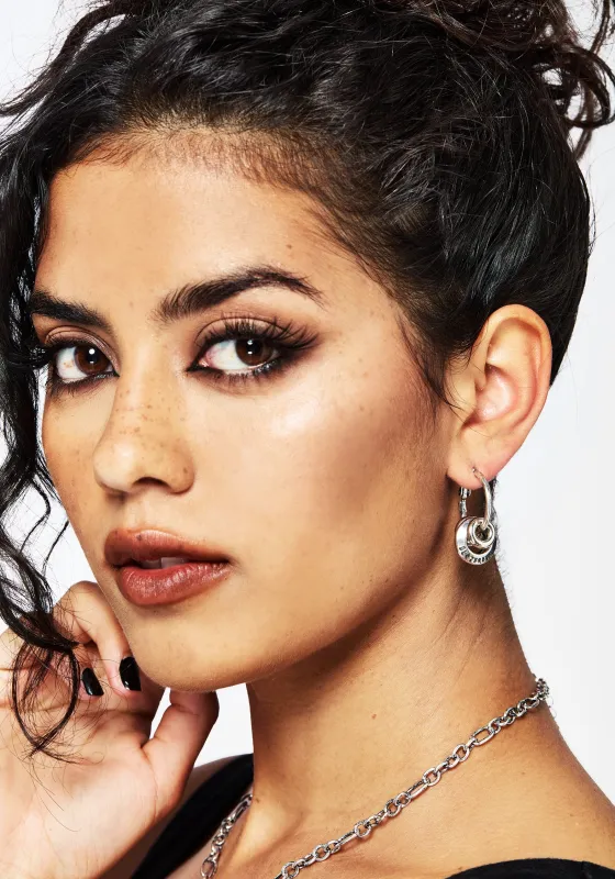 Disturbia Ring Hoop Earrings sold by Disturbia