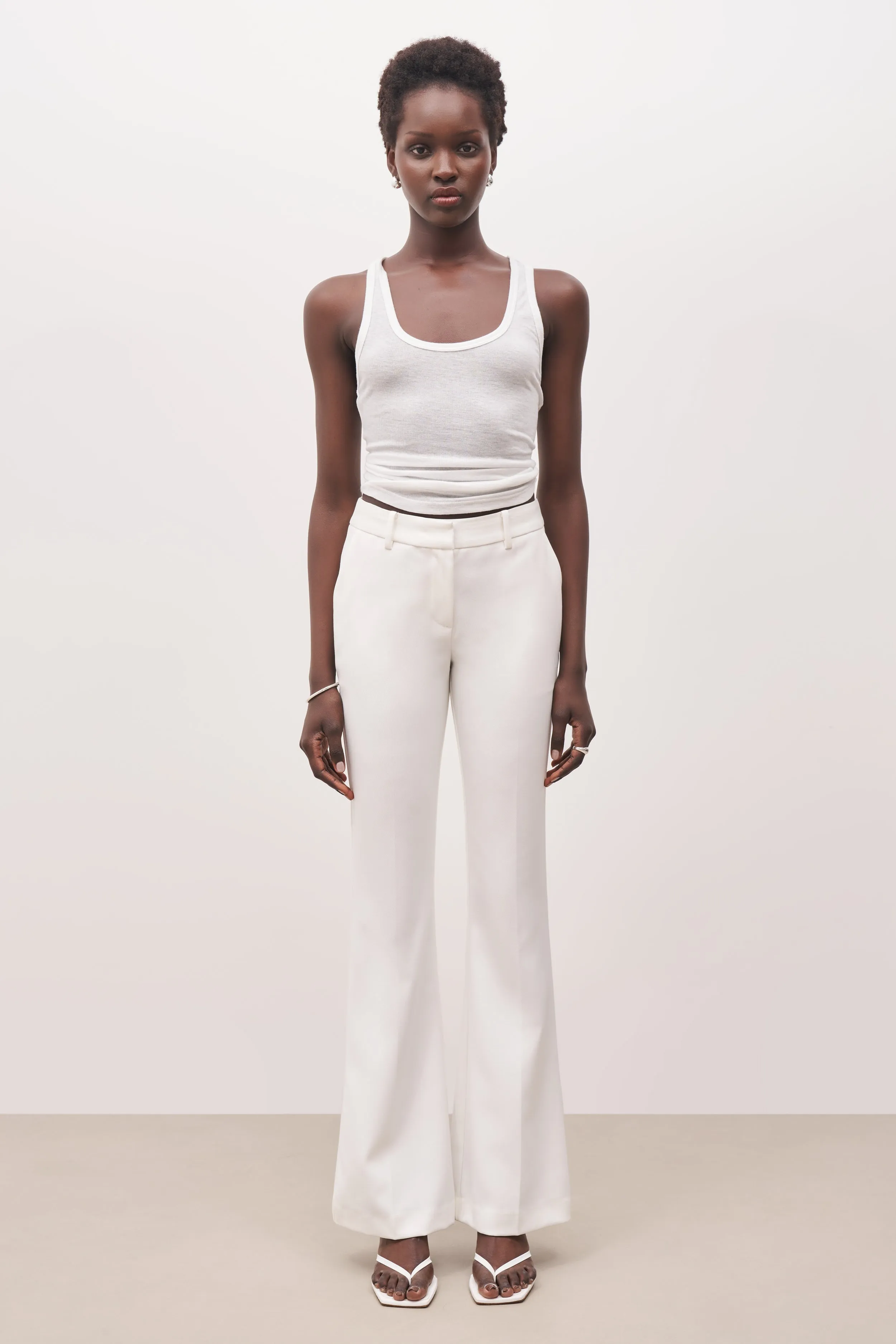 Mid Rise Flared Trousers - White sold by Because of Alice