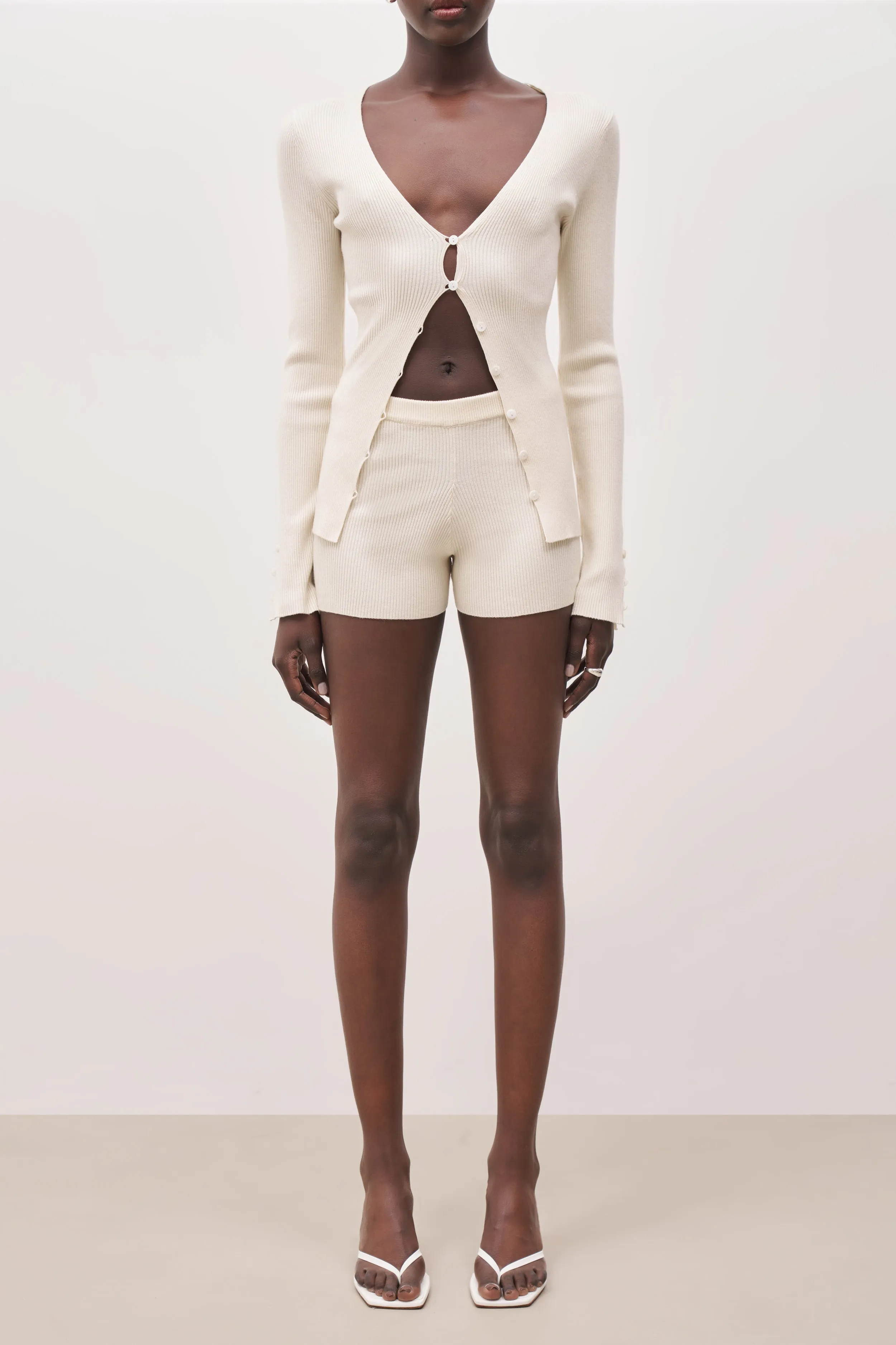 Mid Rise Ribbed Knit Mini Shorts - Cream sold by Because of Alice