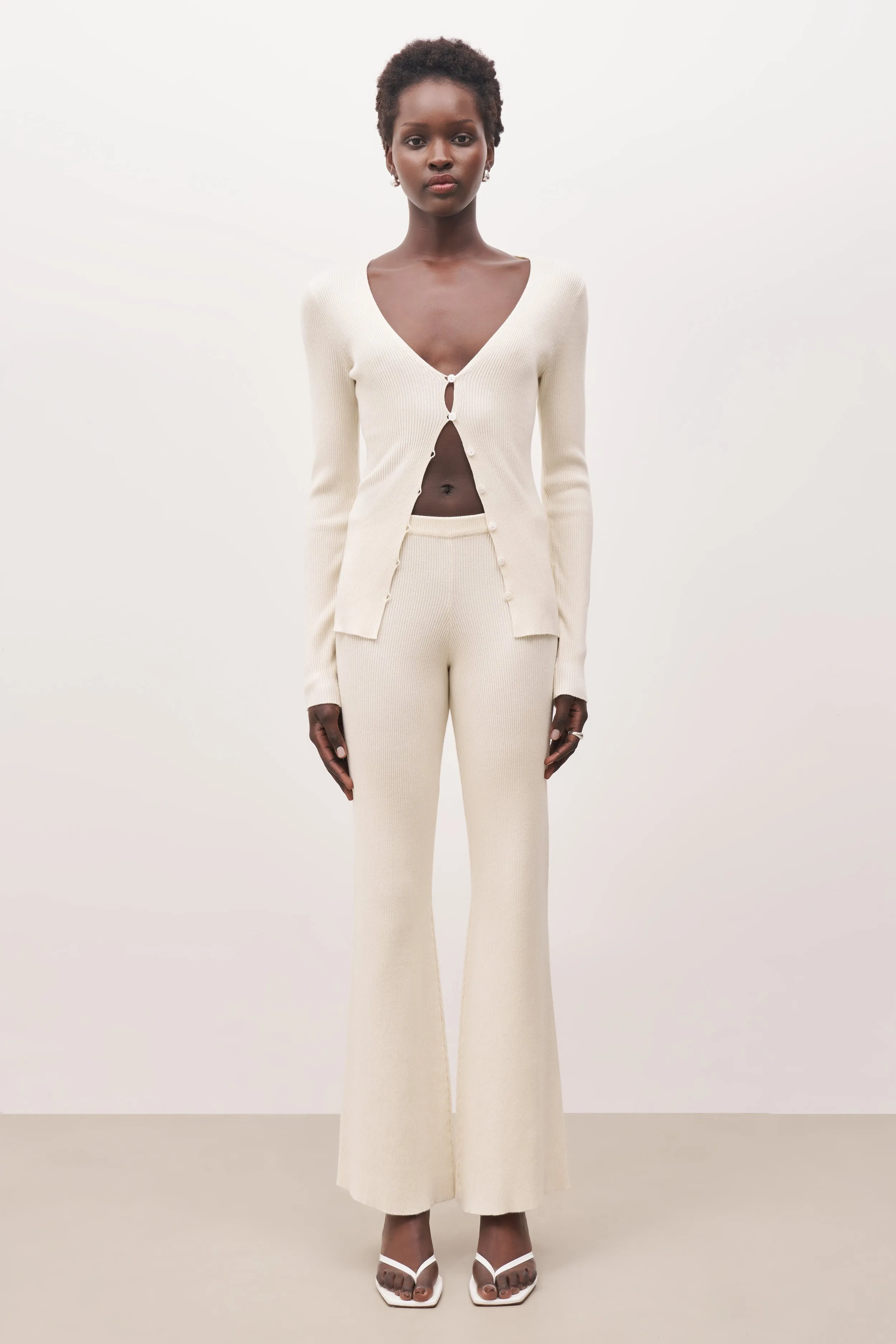 Mid Rise Ribbed Knit Trousers - Cream sold by Because of Alice