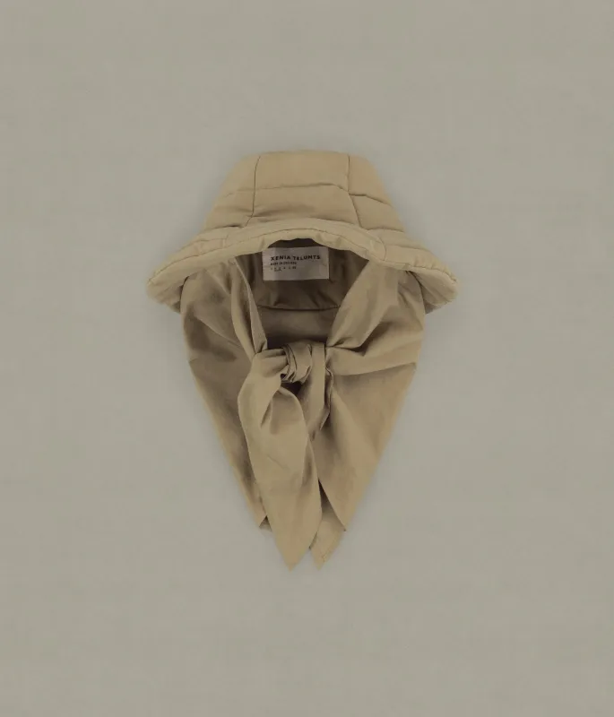 The Snug-Scarf Bucket Hat, Beige sold by XENIA TELUNTS