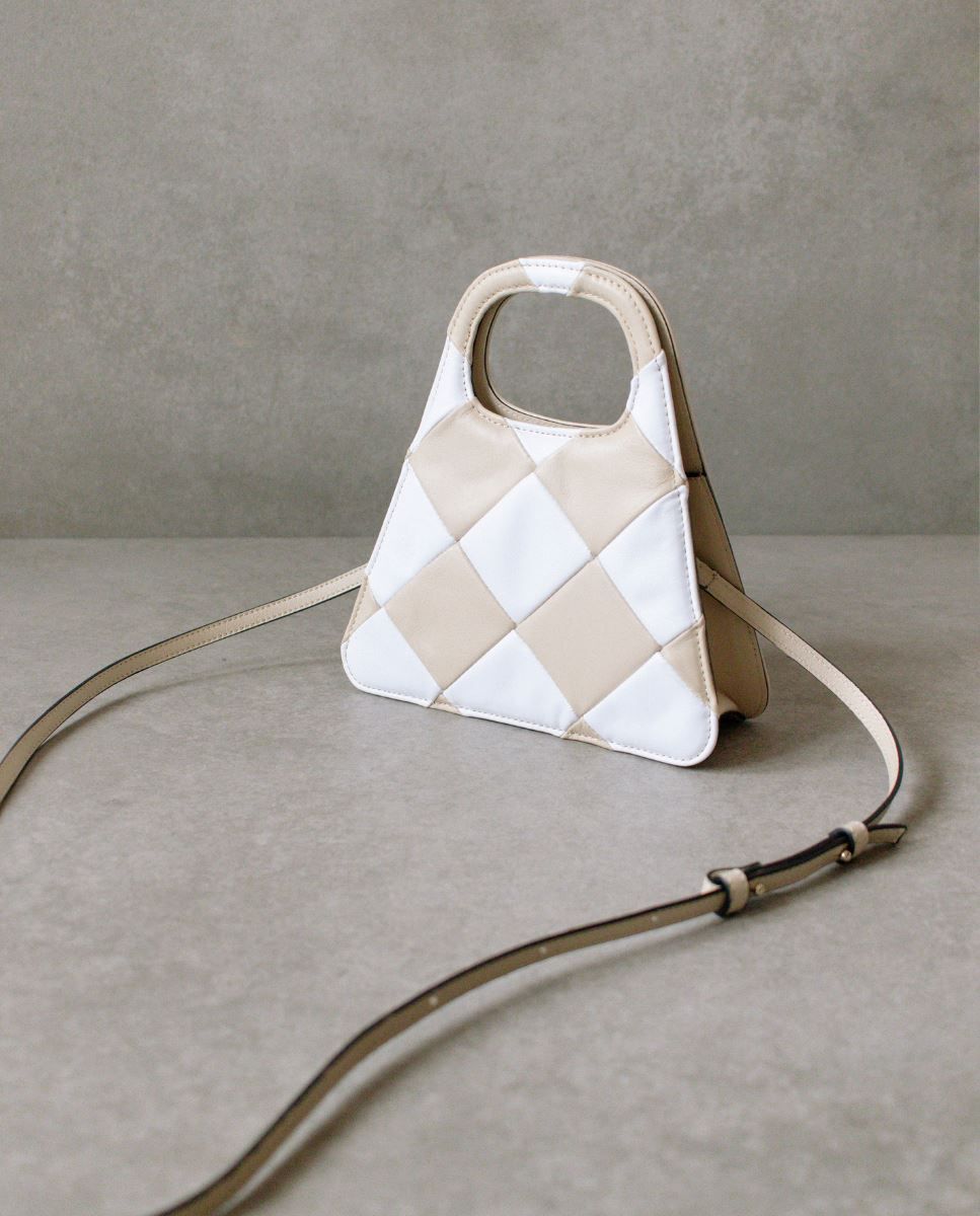 The A Scacchi Stone Beige Cream Leather Crossbody Bag sold by Alohas