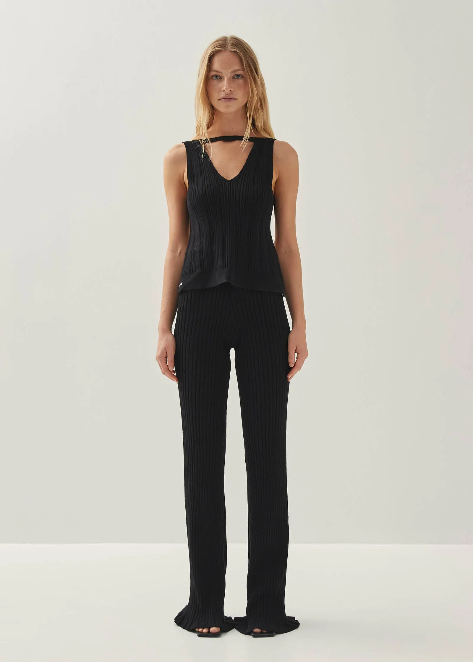 Temis Black Tricot Top sold by Alohas