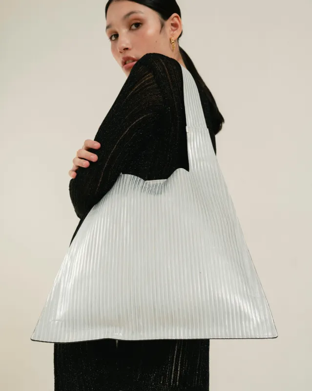 The L Pleated Shimmer Silver sold by Alohas