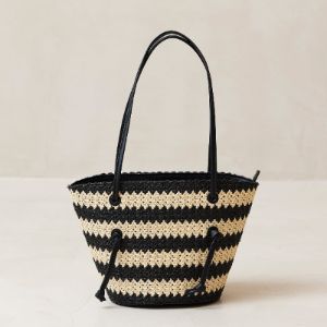The Tangle Crochet Bicolor Black Cream Shoulder Bag sold by Alohas