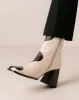 Blair Bicolor Black Cream Ankle Boots sold by Alohas